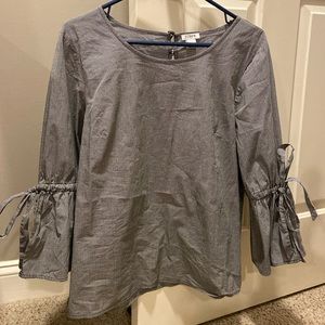 Black and white checkered top with puff sleeve